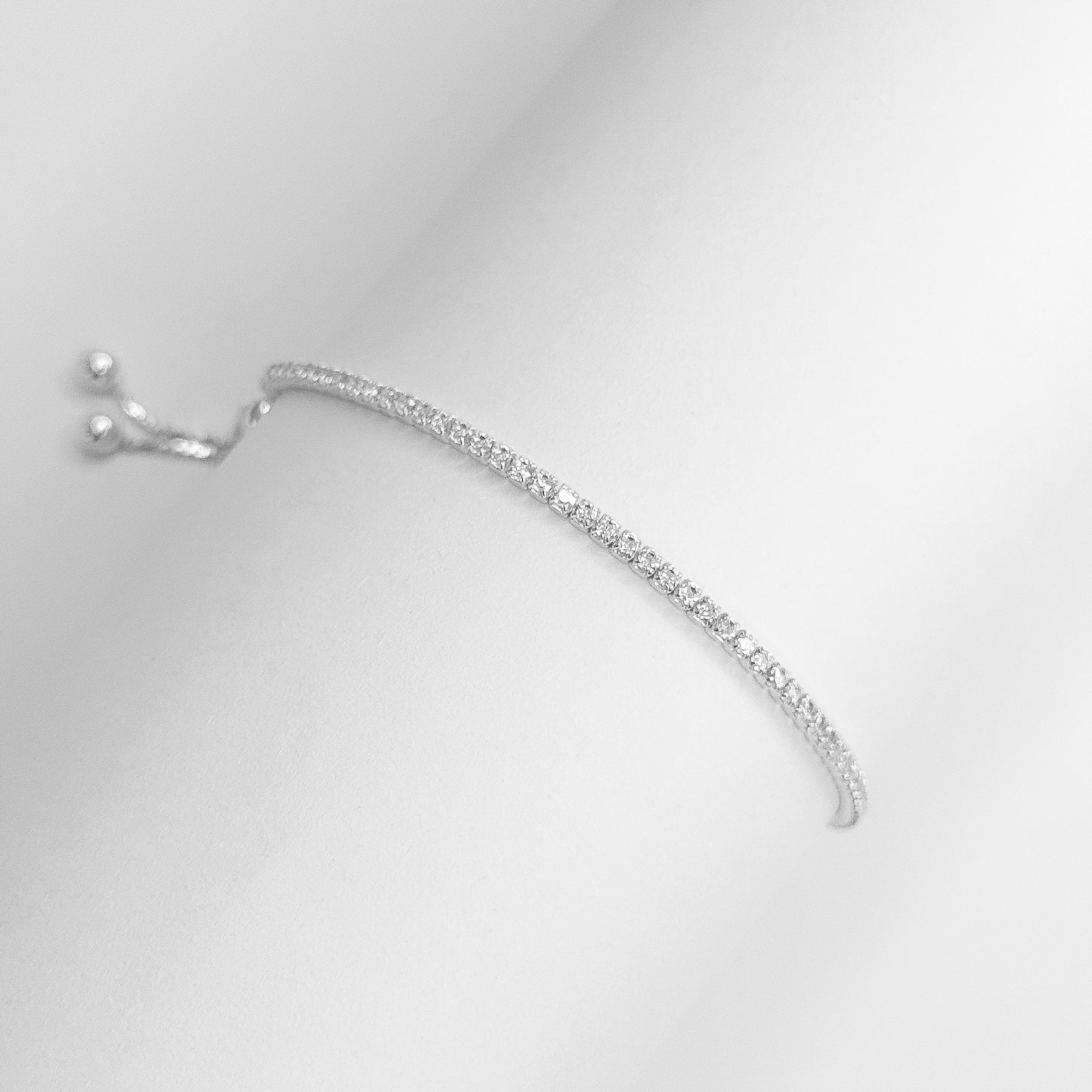 PULSEIRA RIVIERA GRAVATINHA ZIRCÔNIAS BRANCAS